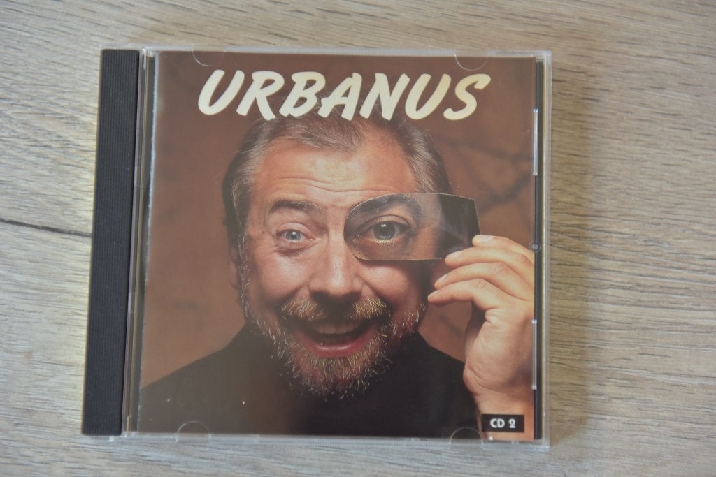 URBANUS -- THE BEST OF DEEL 2, Verzenden, Zo goed als nieuw, Verzamelalbum, Inclusief doosje