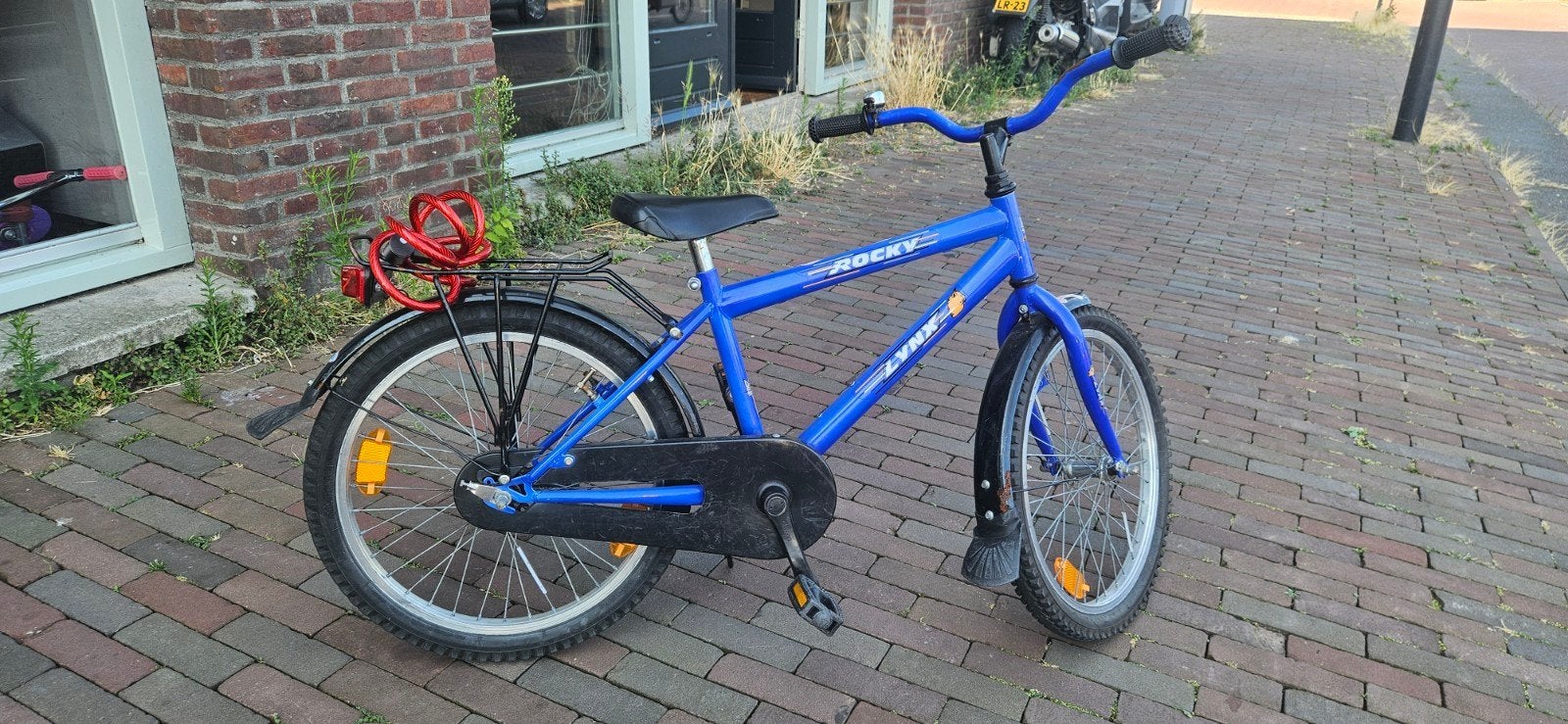 Blauwe kinderfiets - 20 inch - Terugtraprem, Ophalen, Gebruikt, Lynx Rocky, Terugtraprem