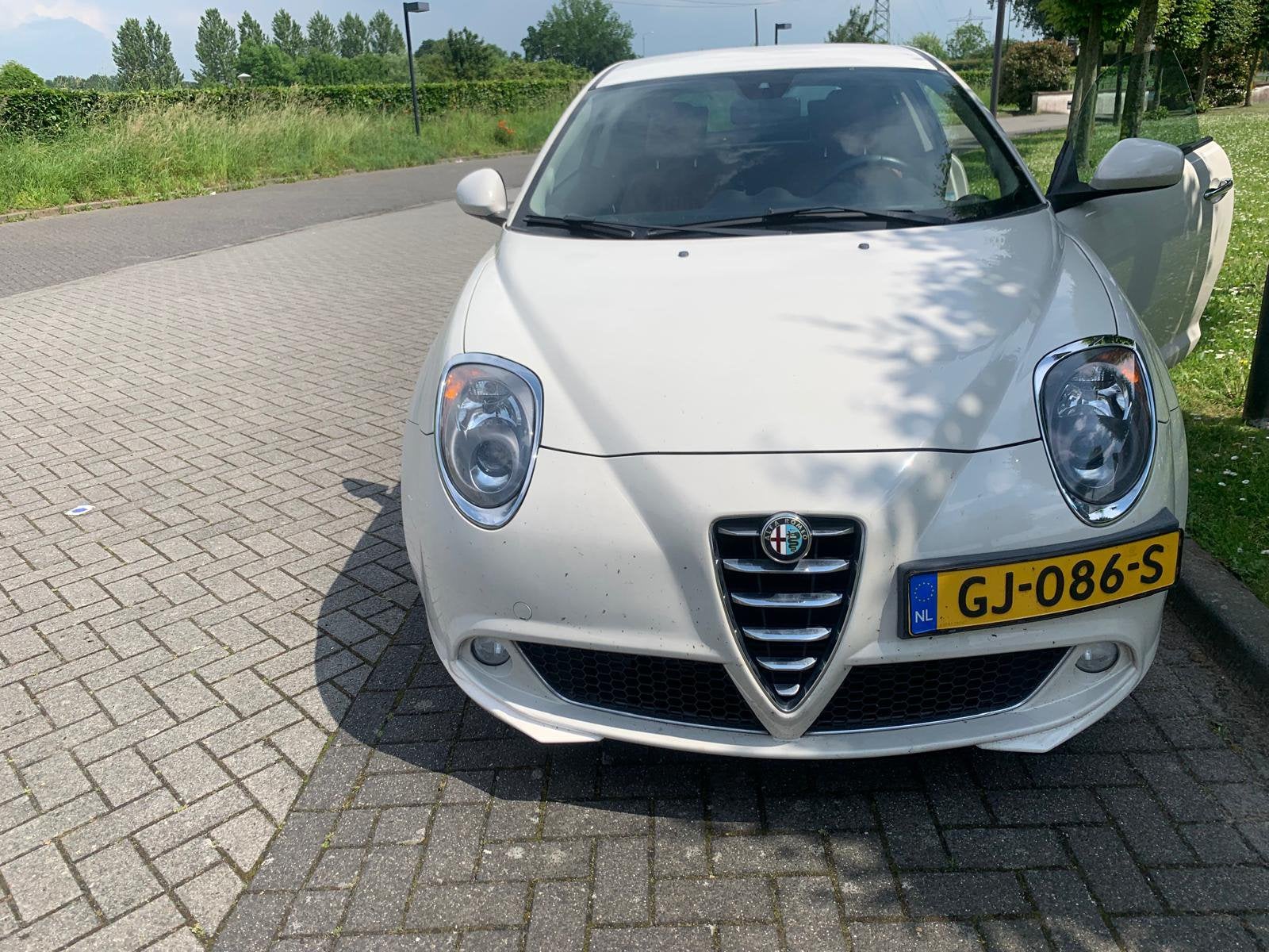 Alfa Romeo MiTo 1.3 Jtdm eco 63KW 2015 Wit, Auto's, Alfa Romeo, Voorwielaandrijving, 4 cilinders, Wit, Bruin