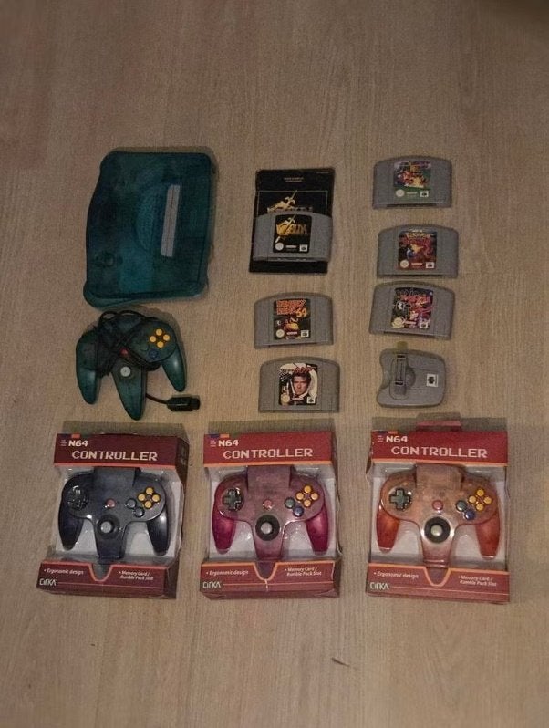 N64 Ice Blue Console Compleet + 6 Top Games & Transfer Pak, Ophalen of Verzenden, Zo goed als nieuw, Met 3 controllers of meer