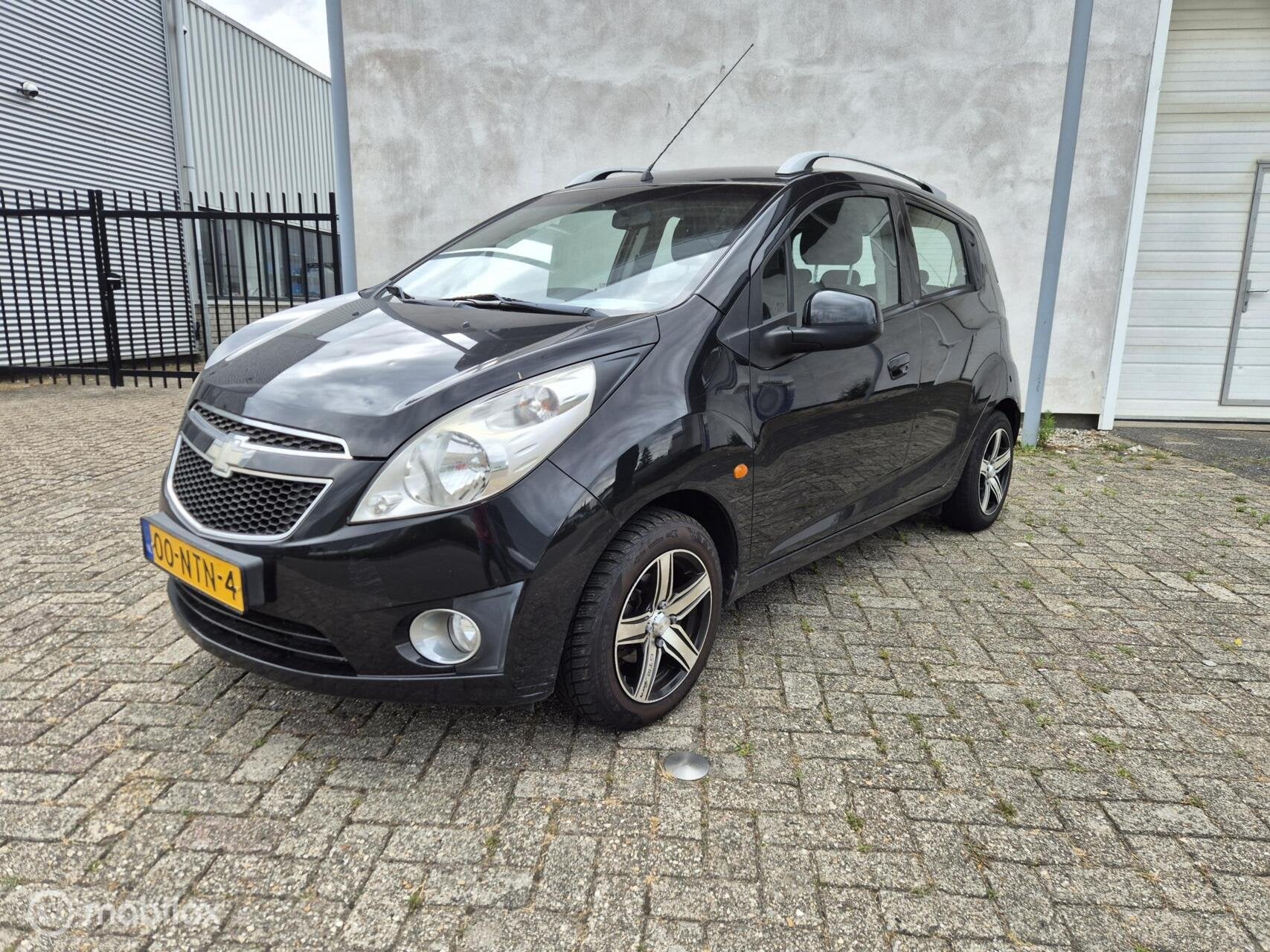 Chevrolet Spark 1.0 16V LS+ Bi-Fuel, Euro 5, 15 km/l, 4 cilinders, Zwart