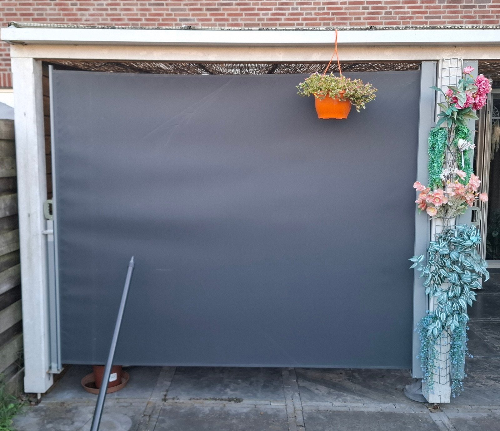 Zijluifel met stalen bak, Ophalen, Knikarmscherm