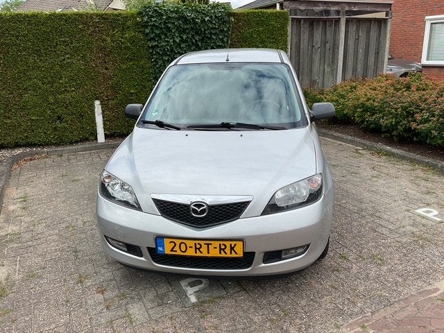 Mazda 2 1.4 16V 2005 Grijs, Auto's, Mazda, Voorwielaandrijving, 1025 kg, 15 km/l, 40 €/maand