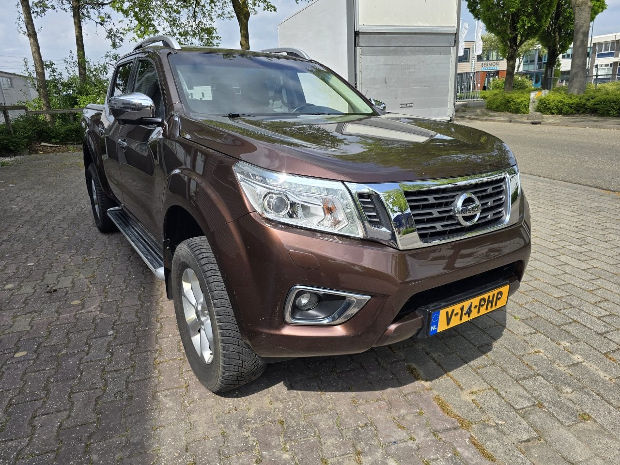 Nissan NP300 NAVARA 2.3Ci TEKNA DOUBLE CAB SNOEKS (bj 2016), Automaat, Gebruikt, Parkeersensor, Bedrijf