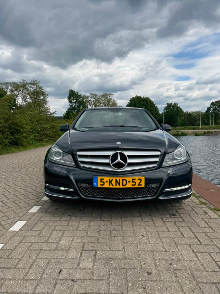 Mercedes-Benz C-Klasse 1.6 C180 Automaat Sedan 2013 Zwart, Achterwielaandrijving, 1800 kg, Zwart, Leder en Stof