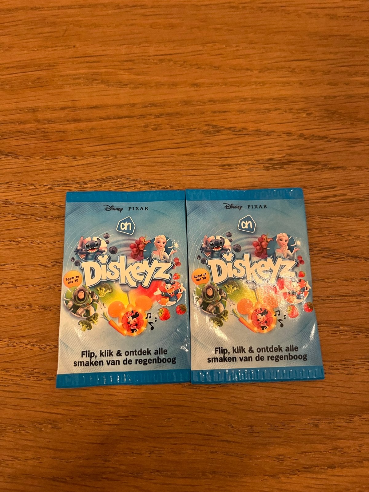 2 Disney Pixar Diskeyz AH spaaractie, Verzamelen, Ophalen of Verzenden, Overige figuren, Nieuw, Overige typen