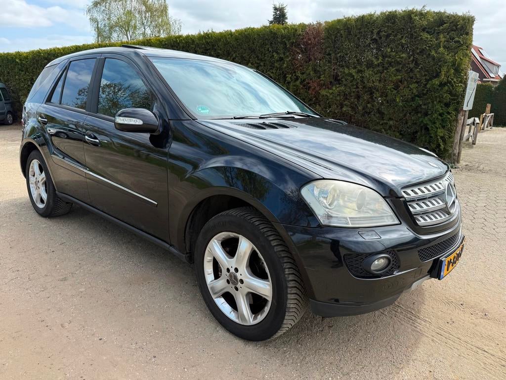 Mercedes-Benz M-klasse 320 CDI Schuifdak/Command/ Grijs kent, Auto's, Automaat, 2240 kg, Gebruikt, Zwart