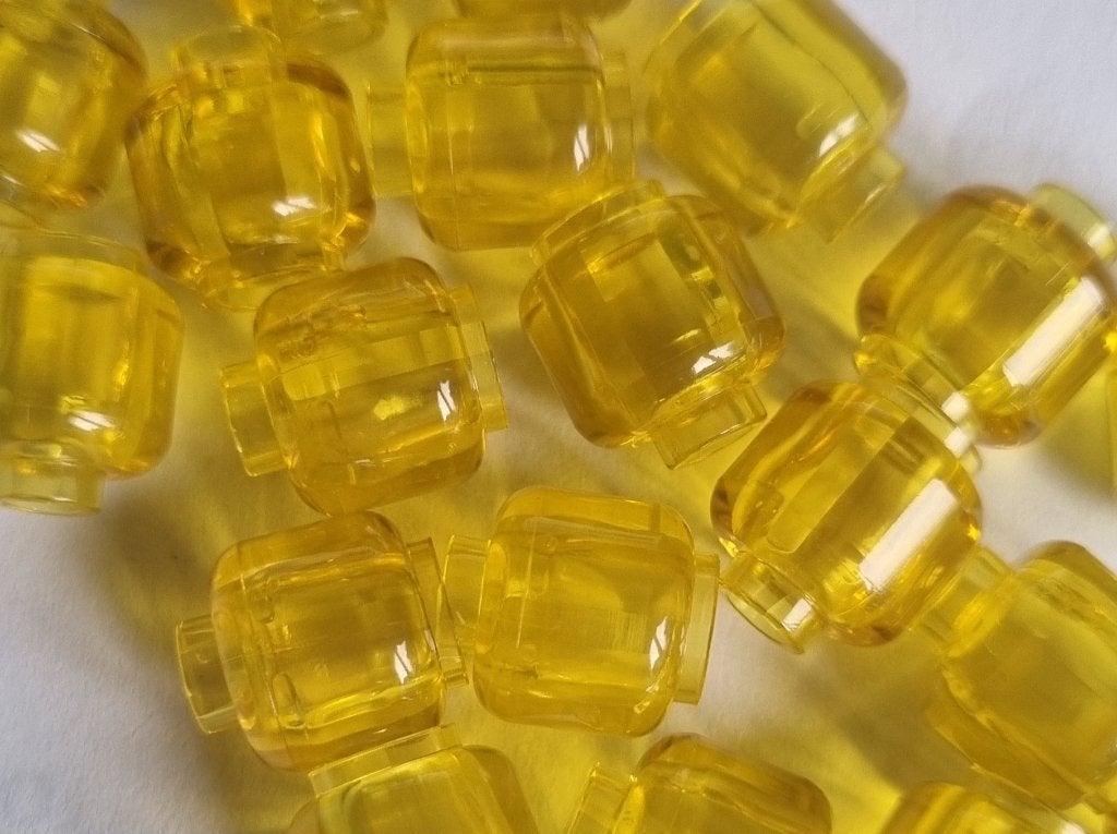 Lego minifigure head, Transparant yellow (per 20), Ophalen of Verzenden, Nieuw, Losse stenen, Lego