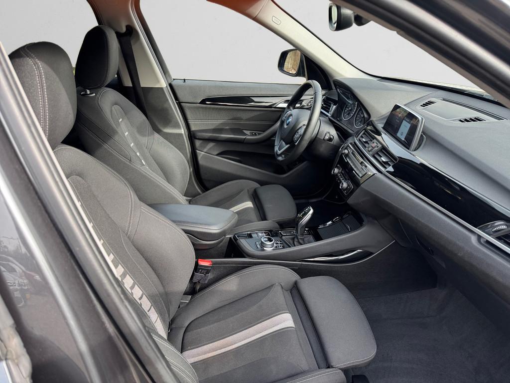 BMW X1 sDrive18i High Executive Aut- Sport Interieur, Stoelv, Stof, Gebruikt, Met garantie (alle), Origineel Nederlands