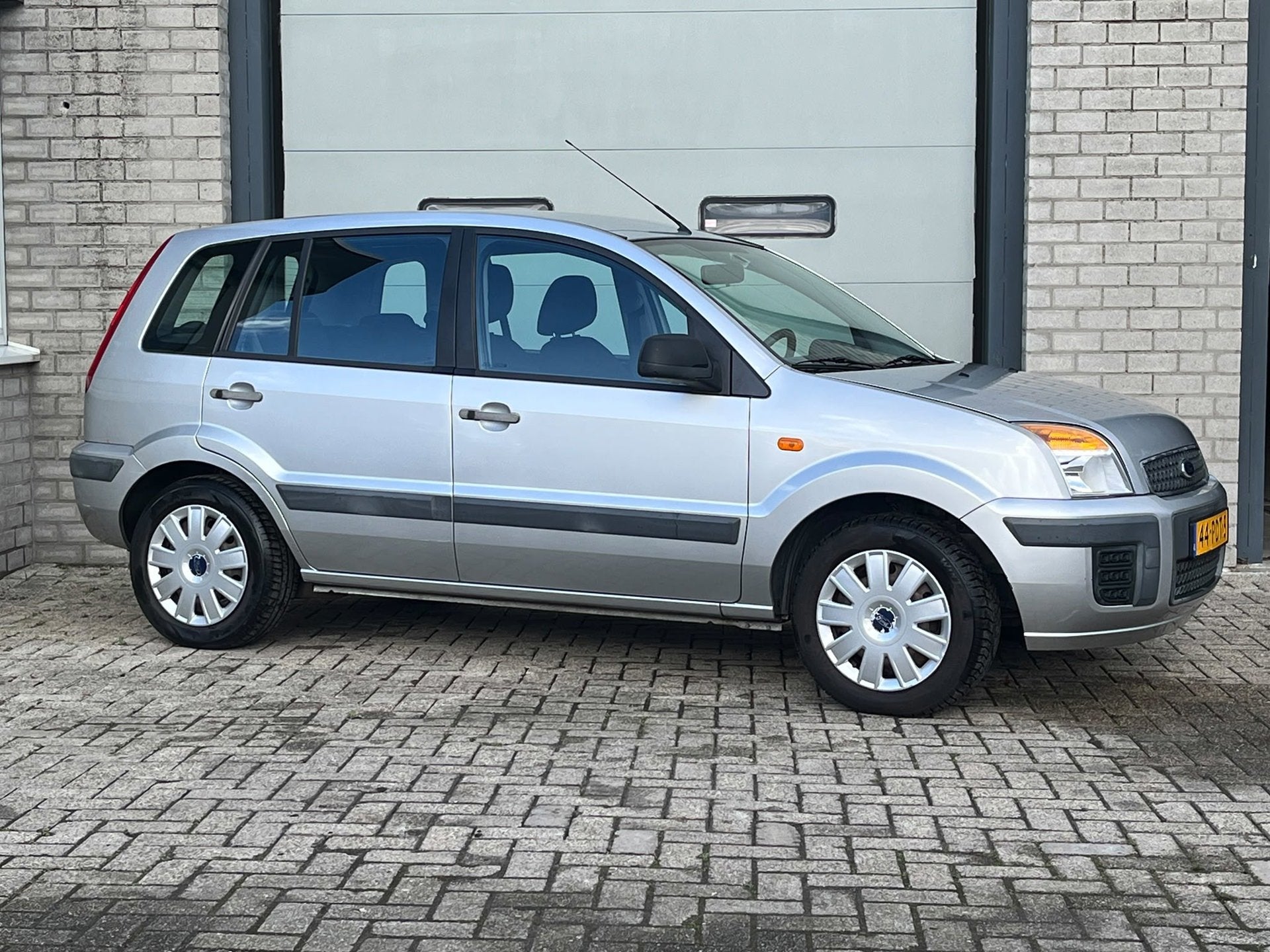 Ford Fusion 1.4-16V Cool & Sound Airco|Nap|Trekhaak, Auto's, Gebruikt, 49 €/maand, Origineel Nederlands, Bedrijf