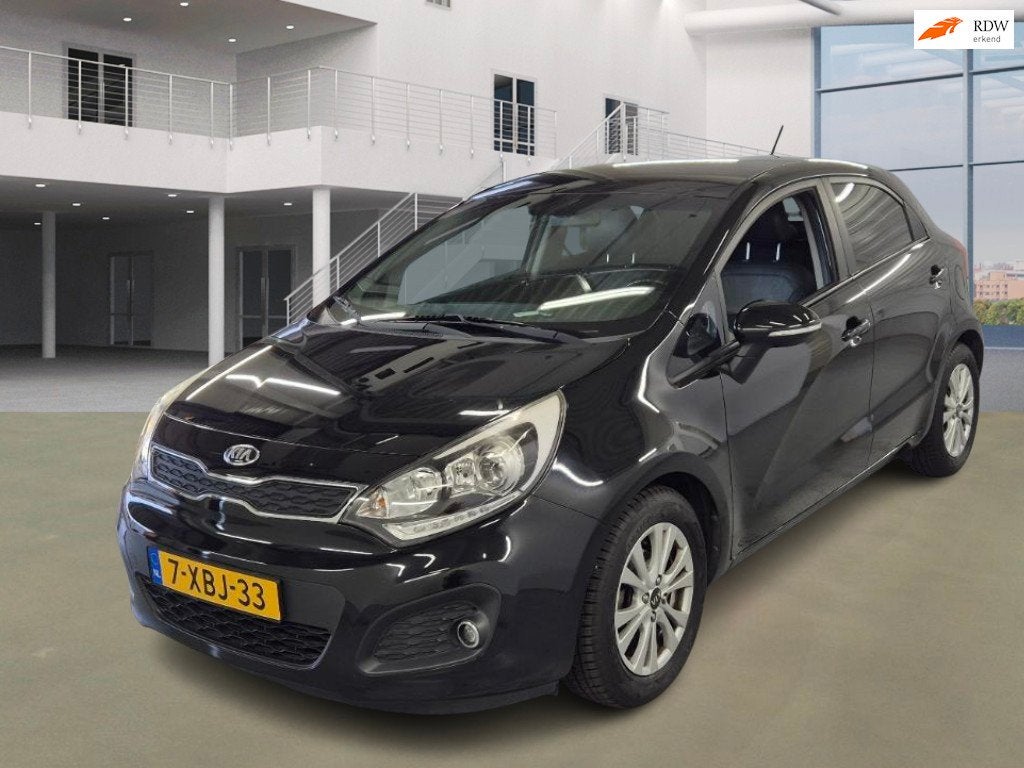 Kia Rio 1.2 CVVT World Cup Edition PSENSOR CRUISE 2 X SLEUTE, Zwart, 4 cilinders, Zwart, Bedrijf