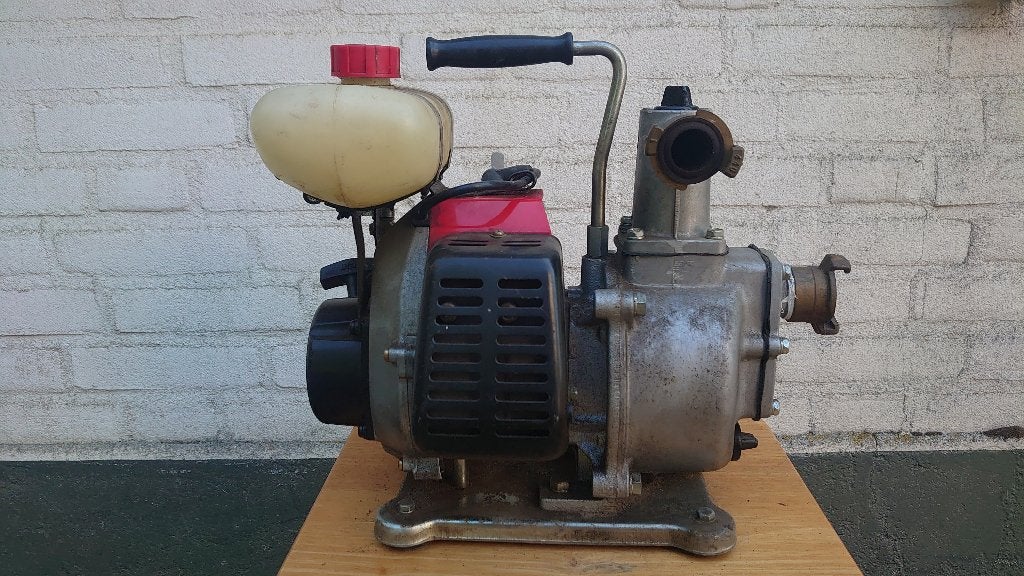 Waterpomp op benzine met zuigslang KAAZ PE25M-0., Ophalen, Zo goed als nieuw, Handmatig, Besproeiingspomp