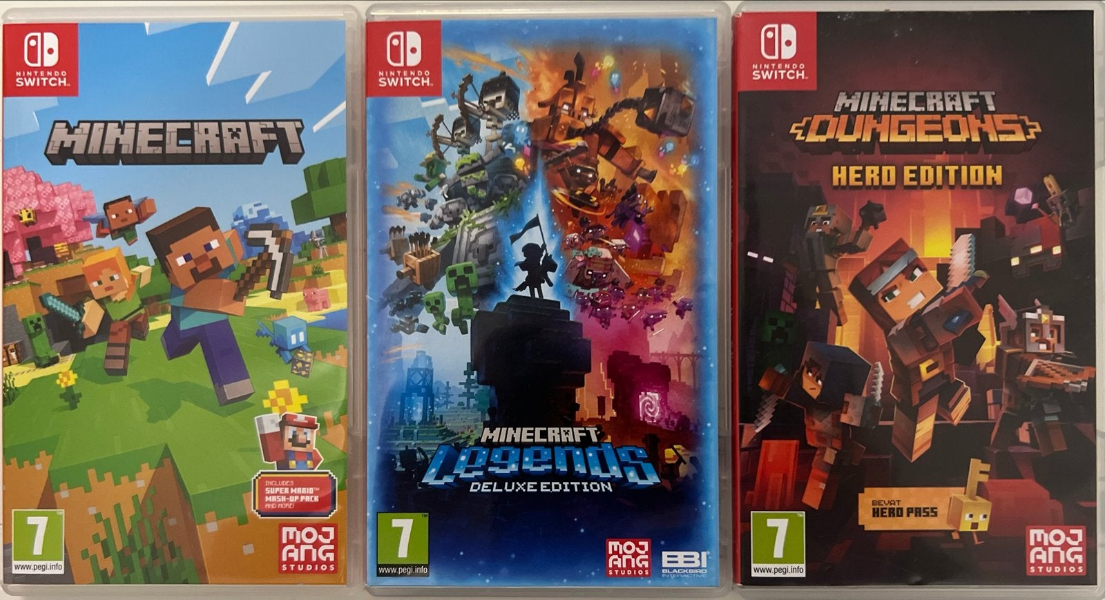 3x Minecraft Switch games: Minecraft, Legends, Dungeons Hero, Spelcomputers en Games, Games | Nintendo Switch, Zo goed als nieuw