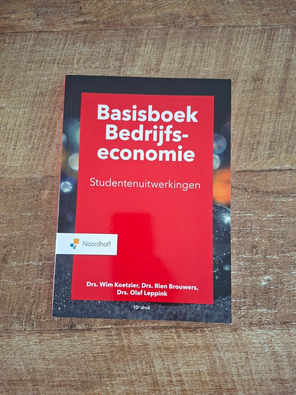 Basisboek Bedrijfseconomie - Studentenuitwerkingen, Drs. Wim Koetzier, Drs. Rien Brouwers, Drs. Olaf Leppink, Zo goed als nieuw