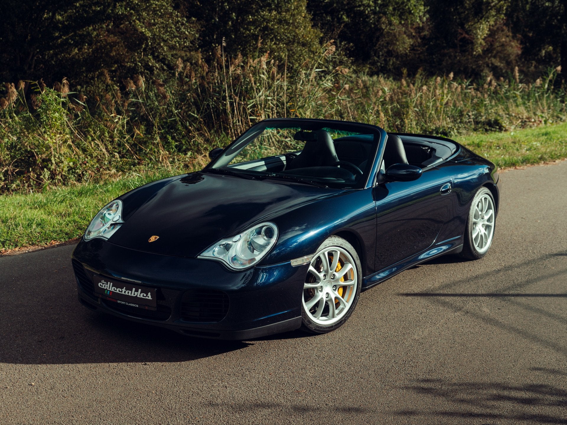 Porsche 911 Cabrio 3.6 Carrera 4S Handgeschakeld PCCB Porsch, Auto's, Dealer onderhouden, Gebruikt, Zwart, Cabriolet