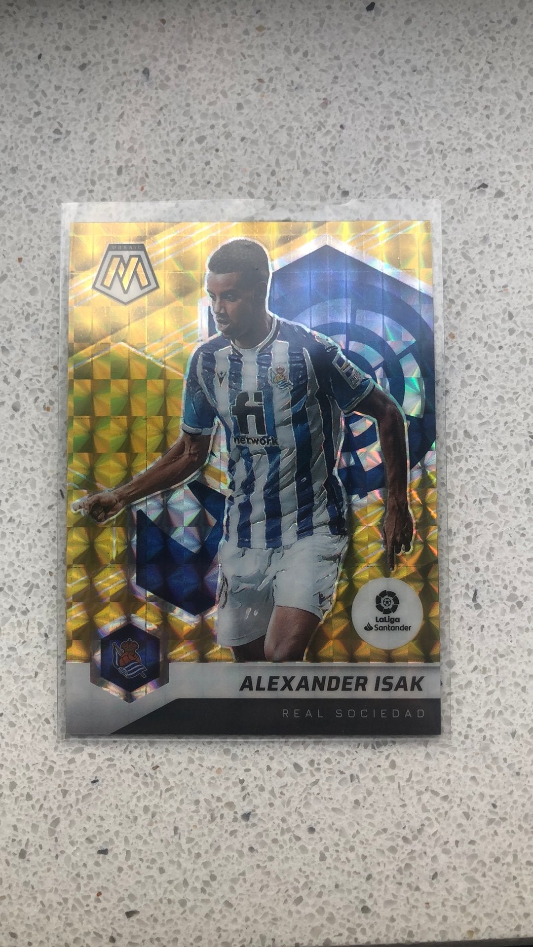 Alexander Isak /10 Gold Panini Mosaic, Ophalen of Verzenden, Zo goed als nieuw, Plaatje