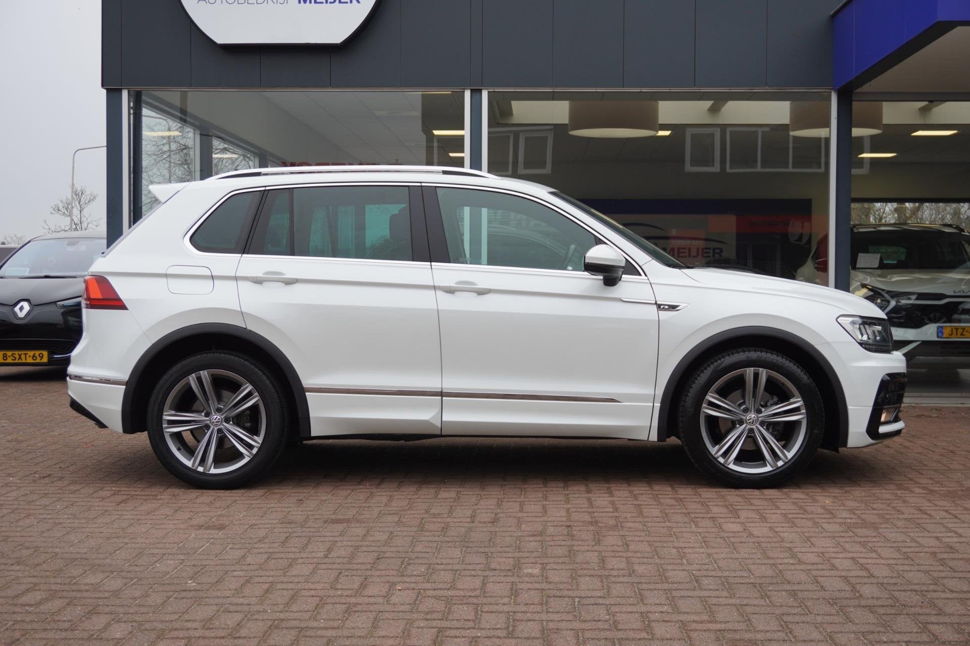 Volkswagen Tiguan 1.4 TSI ACT Highline Business R-Line Autom, Auto's, Volkswagen, Euro 6, 4 cilinders, 150 pk, Leder en Stof