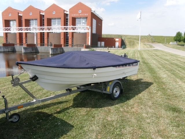 Nieuwstaat Rhea boot met Suzuki motor en trailer, Watersport en Boten, 4 m, 6 pk, Zo goed als nieuw, 2 m