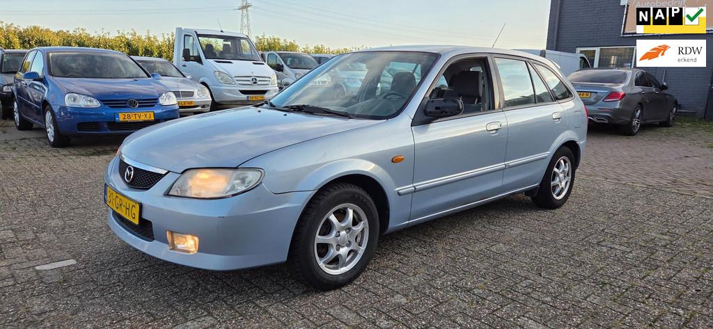 Mazda 323 Fastbreak 1.6 i Exclusive NAP Airco weinig km, Auto's, Mazda, Gebruikt, 4 cilinders, 49 €/maand, Handgeschakeld