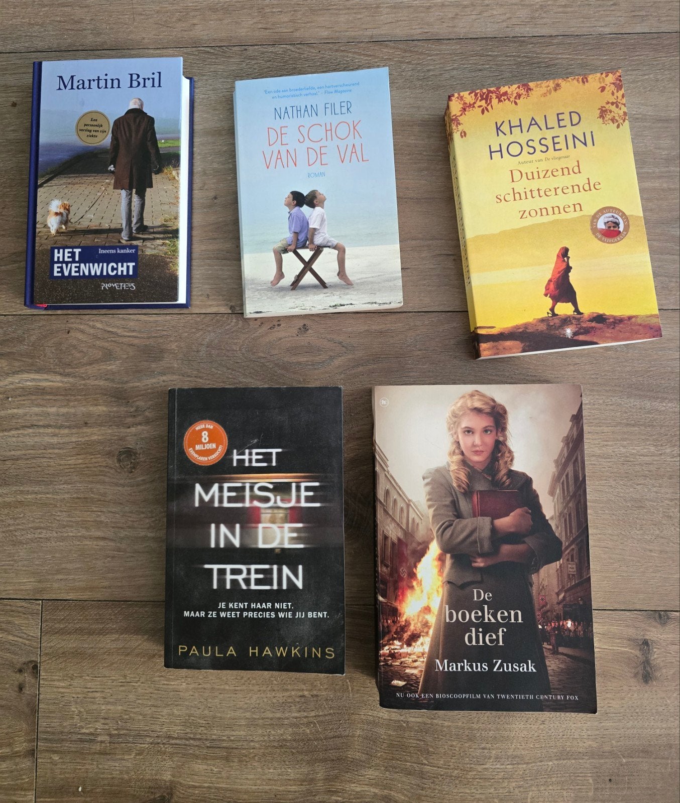 5 boeken: Martin Bril, Khaled Hosseini, Paula Hawkins e.a., Ophalen of Verzenden, Zo goed als nieuw