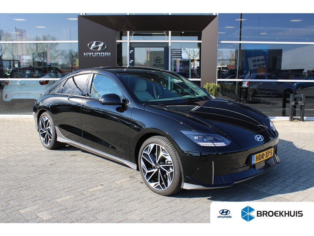 Hyundai IONIQ 6 Lounge AWD 77 kWh | 1500KG trekgewicht | V2L, Auto's, Hyundai, 12 maanden, Gebruikt, Zwart, Sedan
