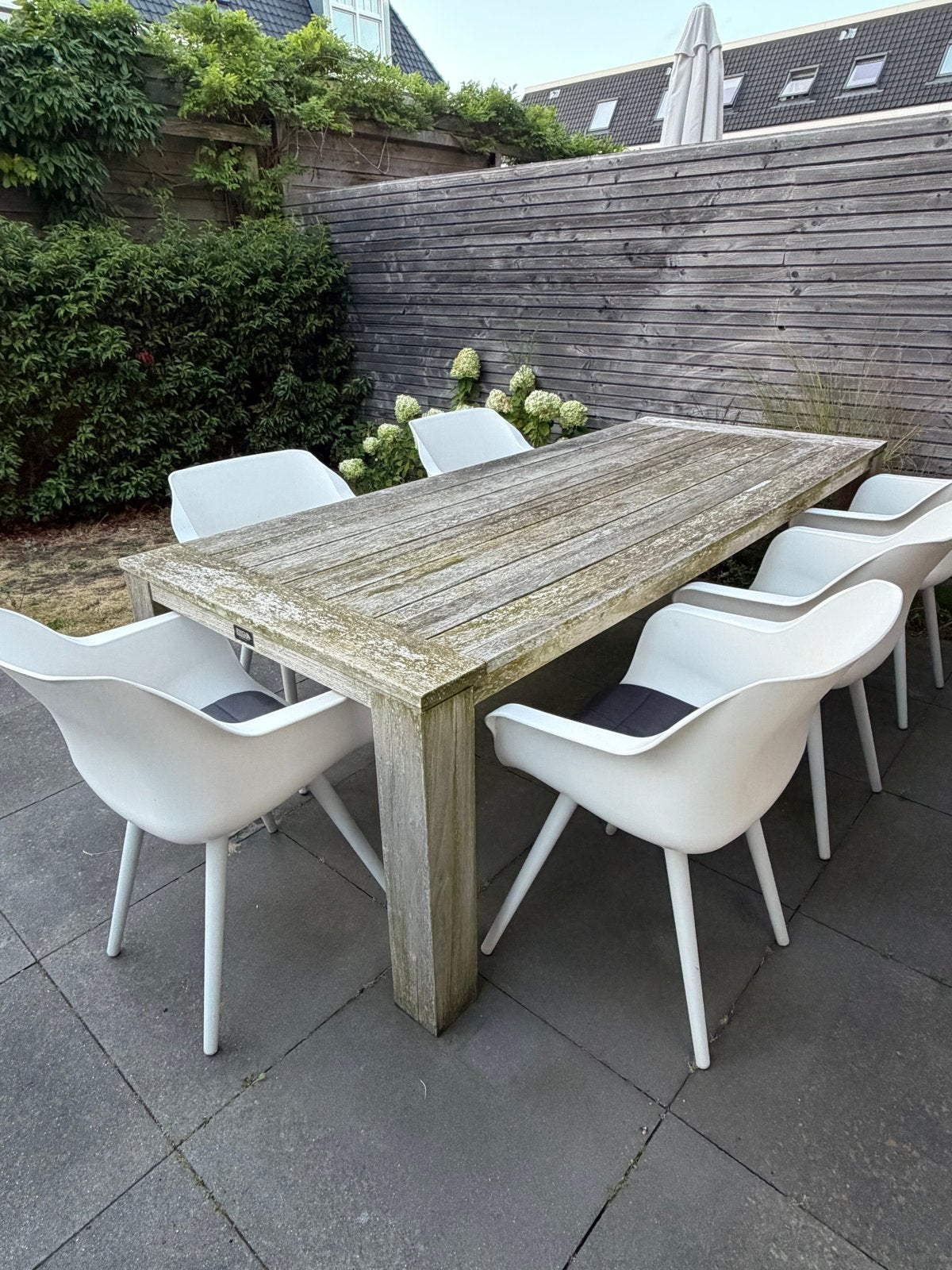 Robuuste teakhouten tuintafel met 6 Hartman stoelen, Ophalen, Gebruikt, Rechthoekig, Teakhout