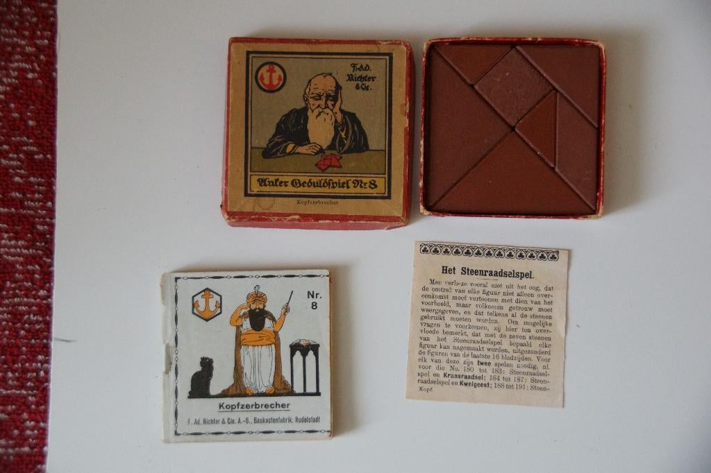 Antieke stenen puzzel met boekje, Antiek en Kunst, Antiek | Speelgoed, Ophalen of Verzenden