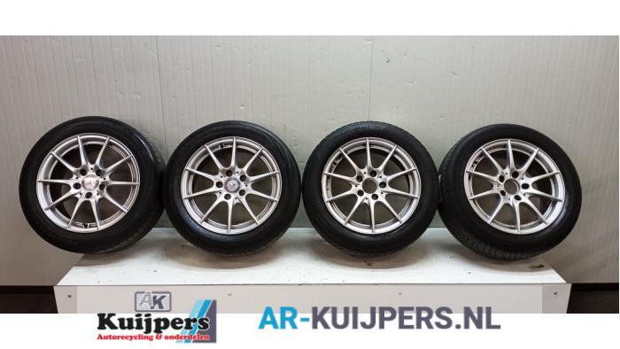 Sportvelgenset + winterbanden van een Mercedes CLK, Gebruikt, Personenwagen