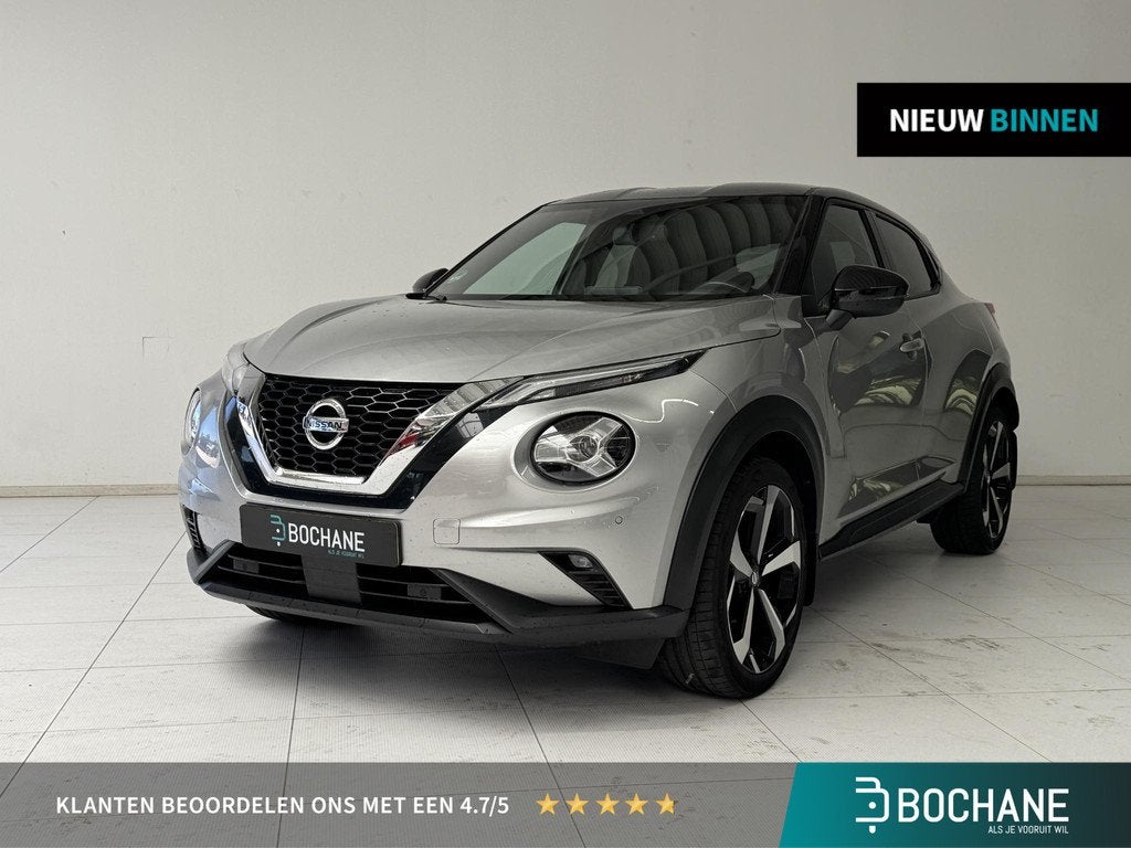Nissan Juke 1.0 DIG-T Premiere Edition | Navigatie | Camera, Auto's, Nissan, Stof, Automatische klimaatregeling, Met garantie (alle)