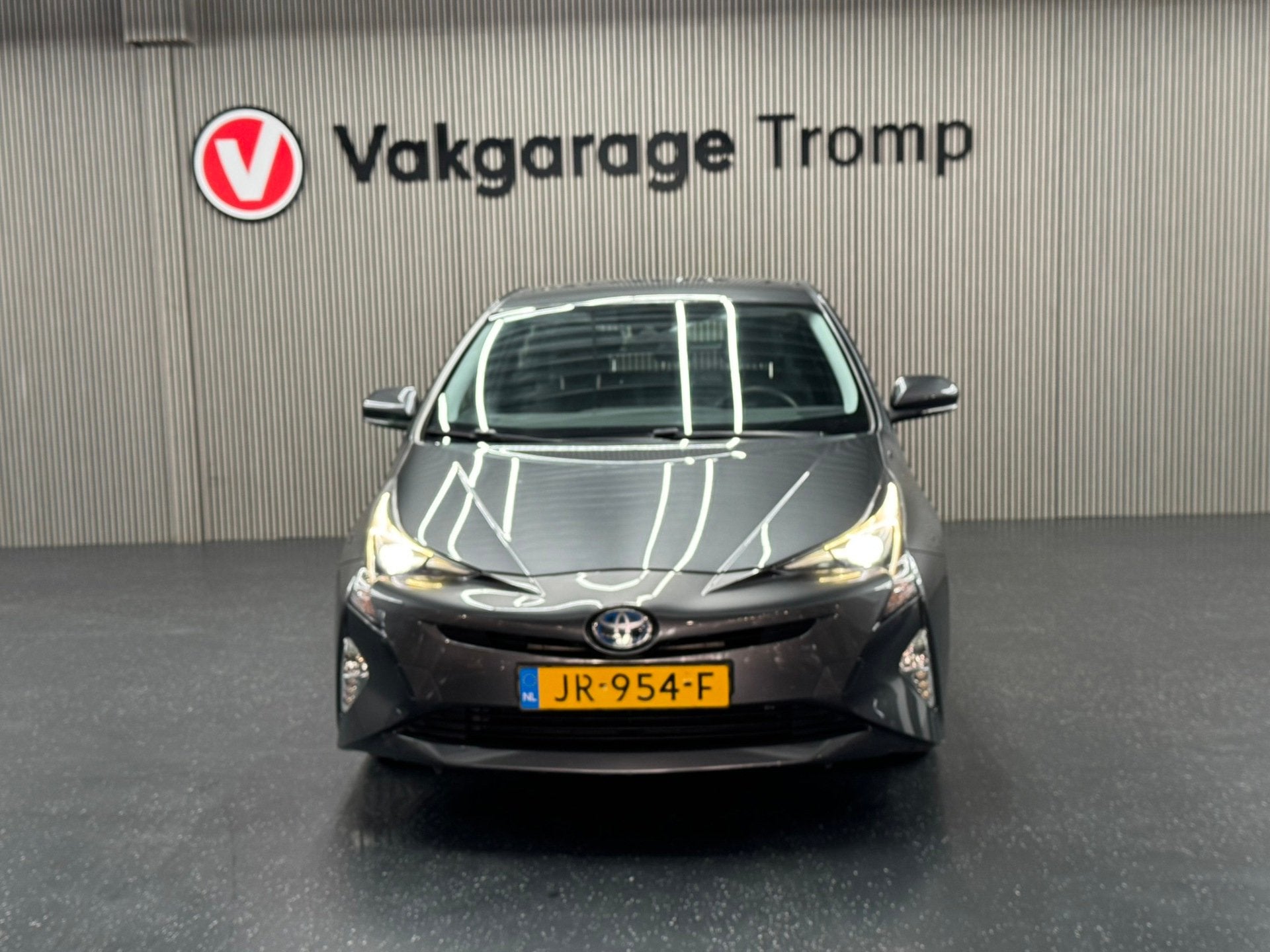 Toyota Prius 1.8 Aspiration, Stof, Met garantie (alle), Bedrijf, Hybride Elektrisch/Benzine