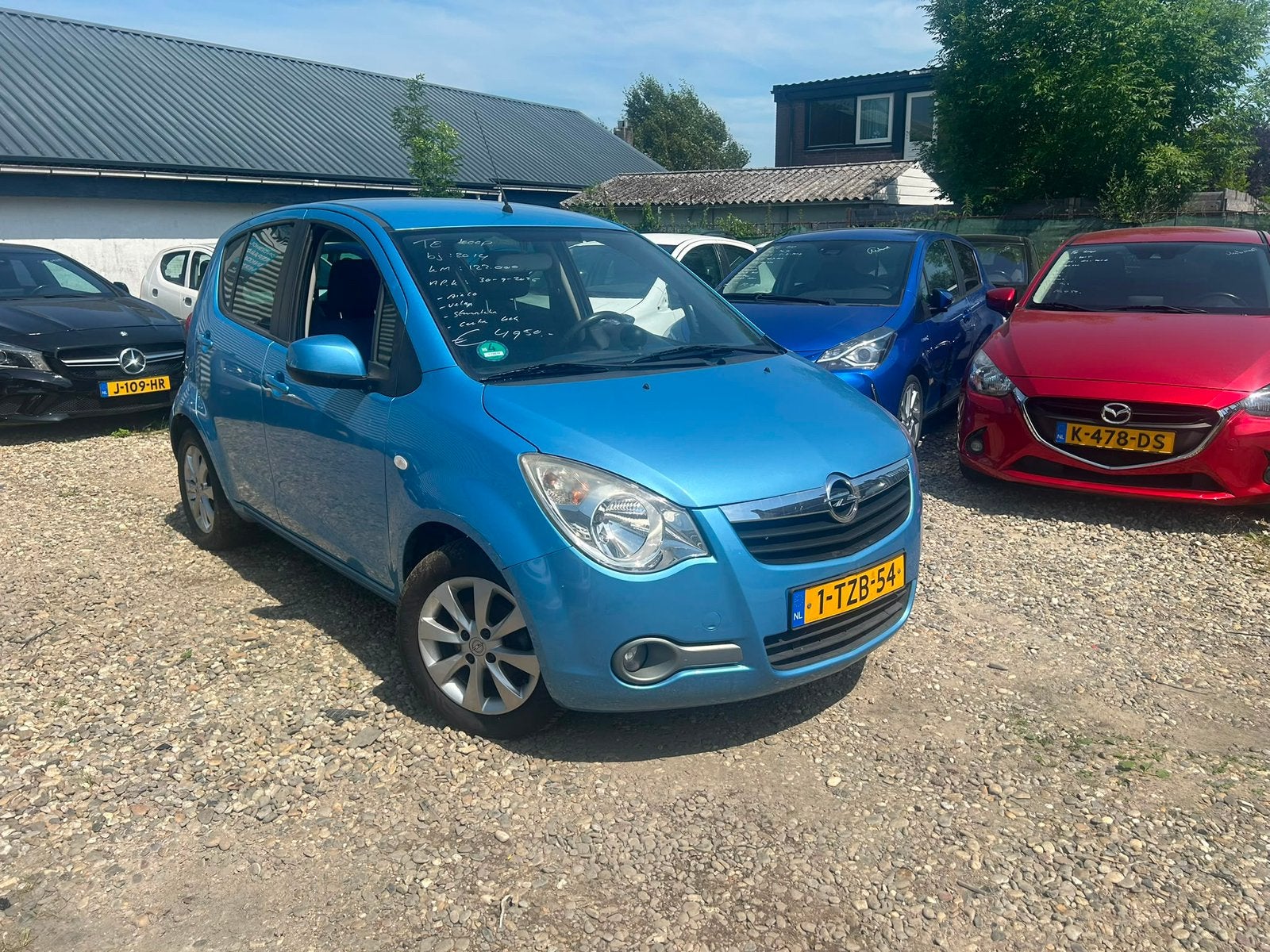 Opel Agila 1.0 12V 2014 Blauw km 123.188 nap, Auto's, Voorwielaandrijving, Stof, 31 €/maand, 4 cilinders