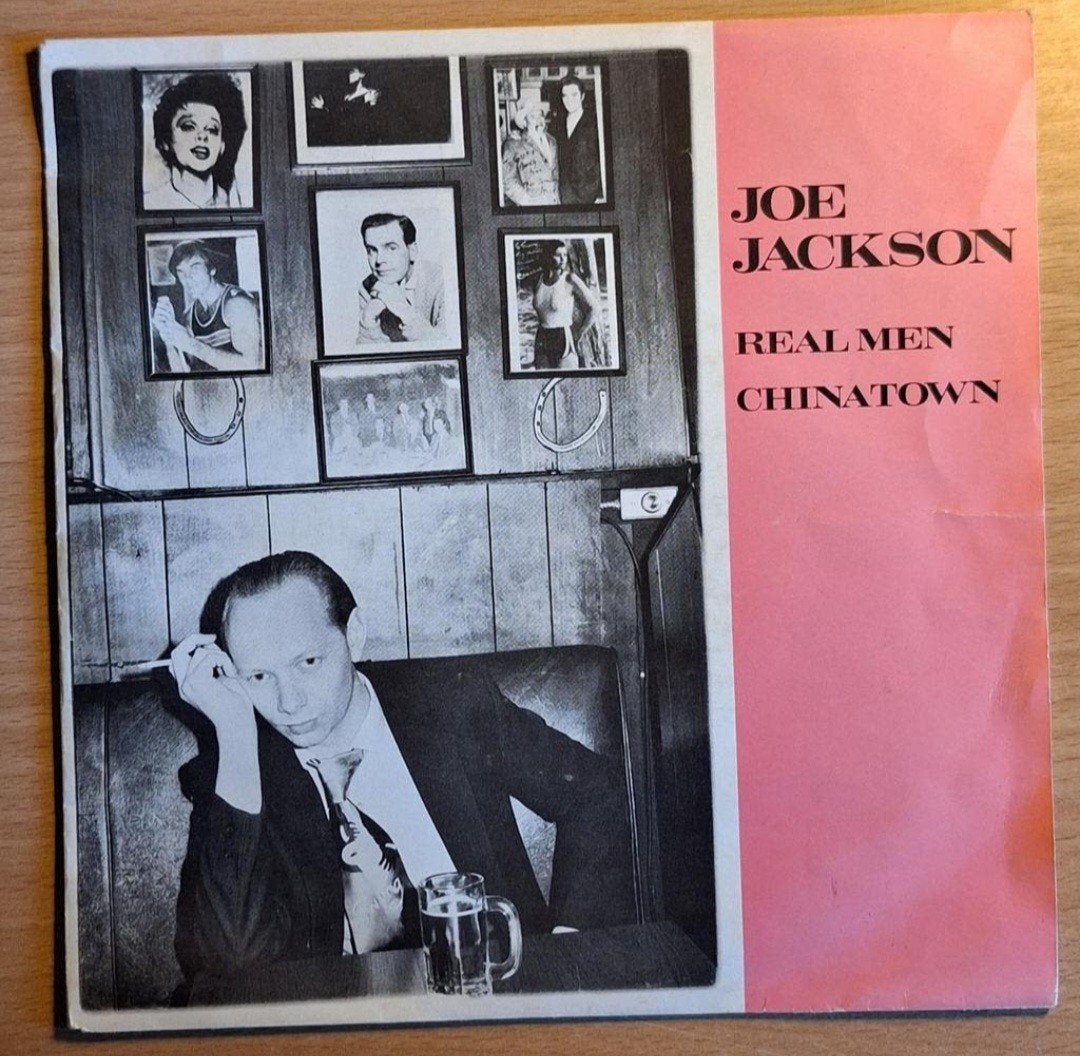 Joe Jackson - Real Men / Chinatown vinyl single (1982), 7 inch, Ophalen of Verzenden, Zo goed als nieuw, Pop