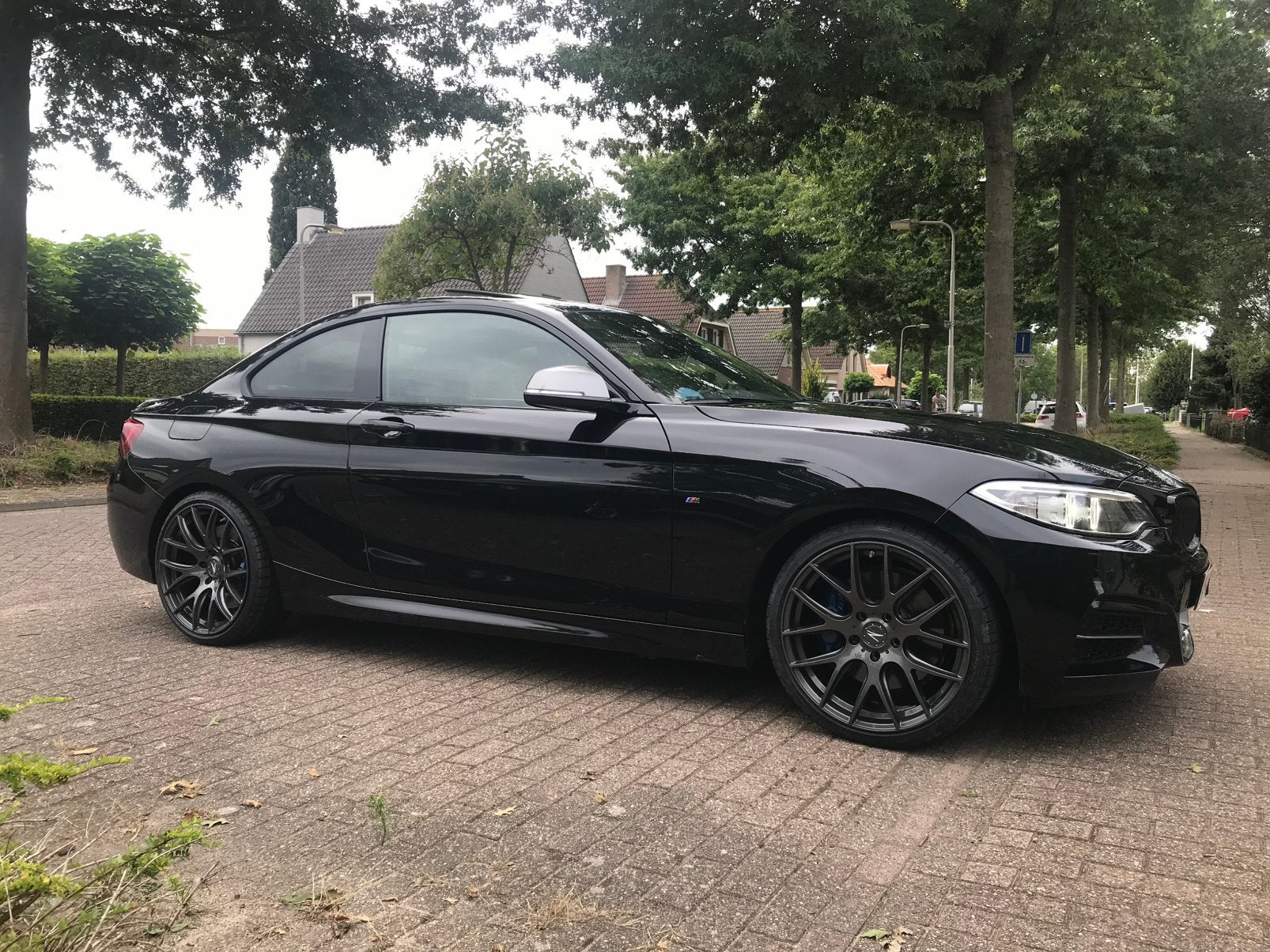 BMW M235i X-drive 2015, Auto's, BMW, Zwart, 4 stoelen, Zwart, Vierwielaandrijving
