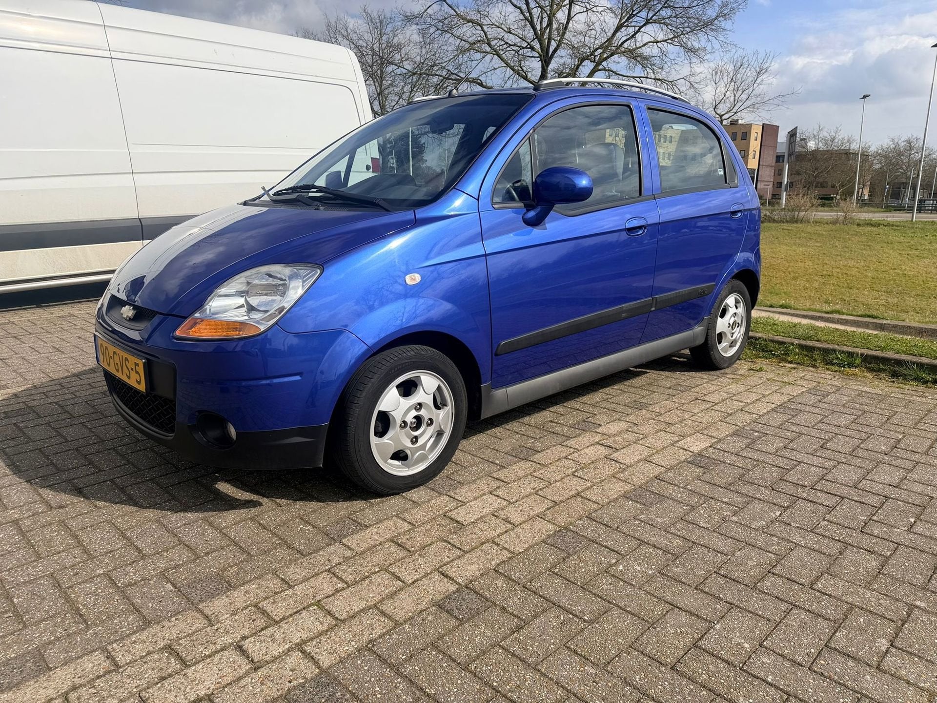 Chevrolet Matiz 0.8 Benzine - Automaat - Airco, Auto's, Gebruikt, Blauw, Metallic lak, Origineel Nederlands