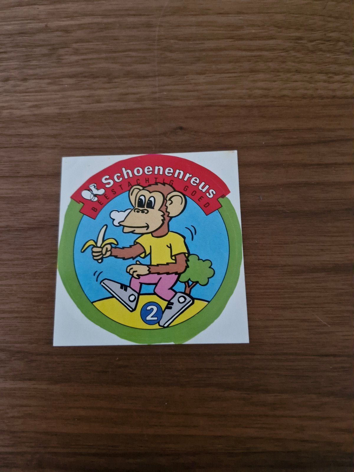 8942 Vintage Schoenenreus sticker - Aap met banaan, Ophalen of Verzenden, Zo goed als nieuw, Bedrijf of Vereniging