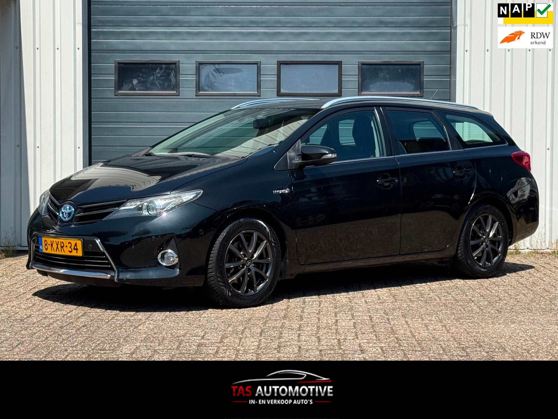 Toyota Auris Touring Sports 1.8 Hybrid Executive NAVI/CRUISE, Euro 5, Gebruikt, Leder en Stof, Zwart