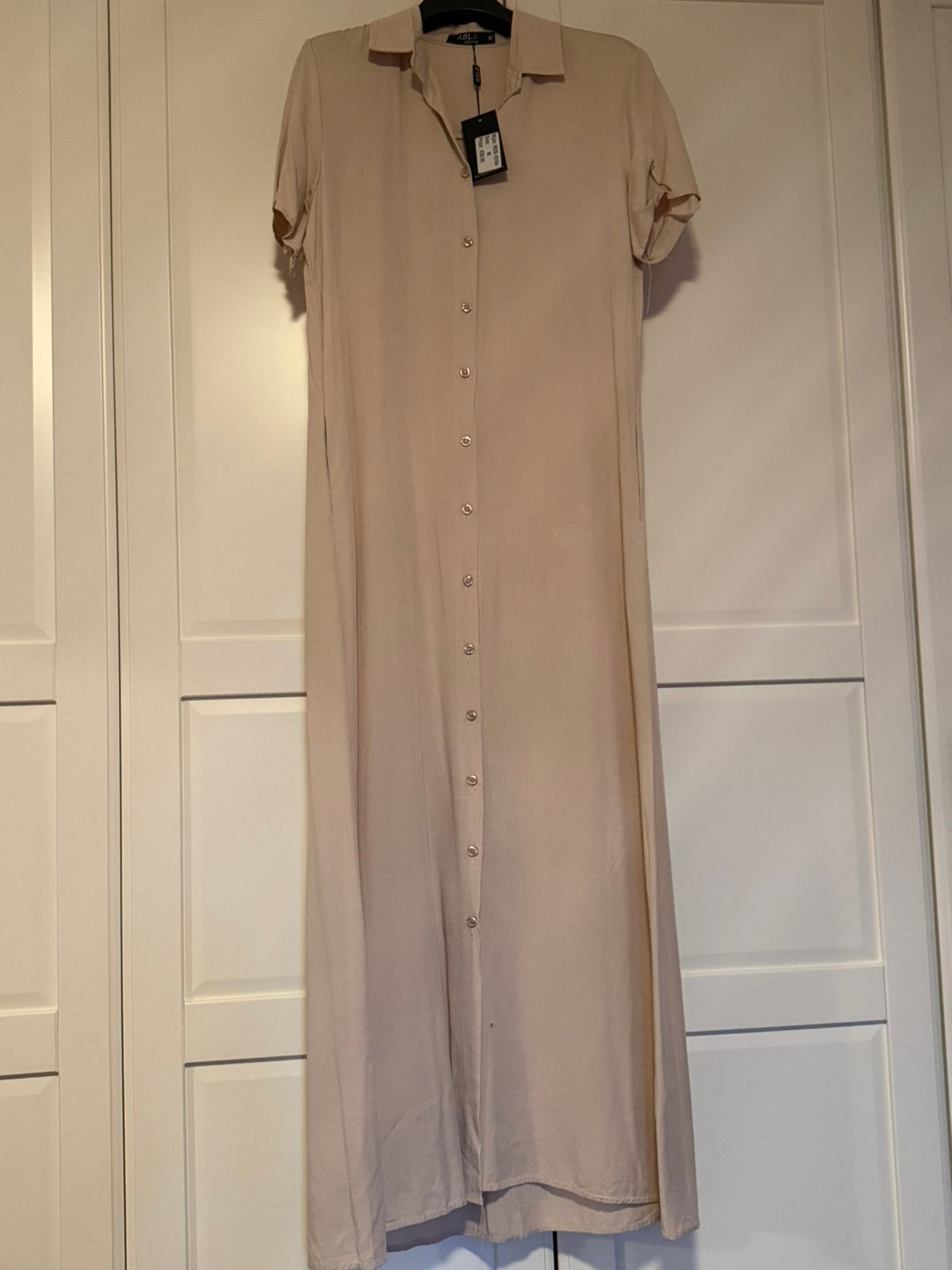 Nieuw jurk, Ophalen of Verzenden, Nieuw, Maat 38/40 (M), Onder de knie