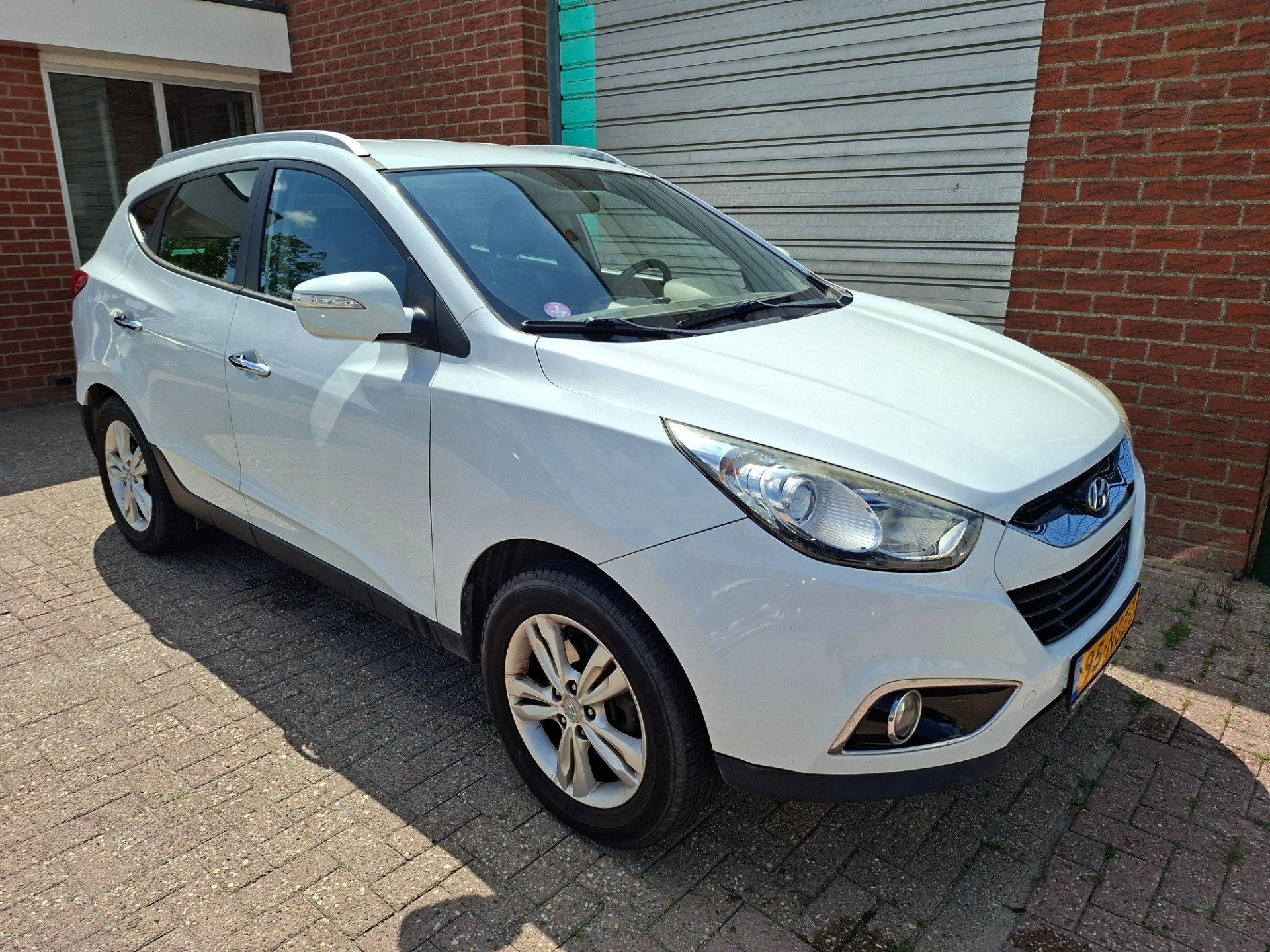 Hyundai Ix35 2.0i Style Clima NAP, Gebruikt, 4 cilinders, Automatische klimaatregeling, Leder en Stof