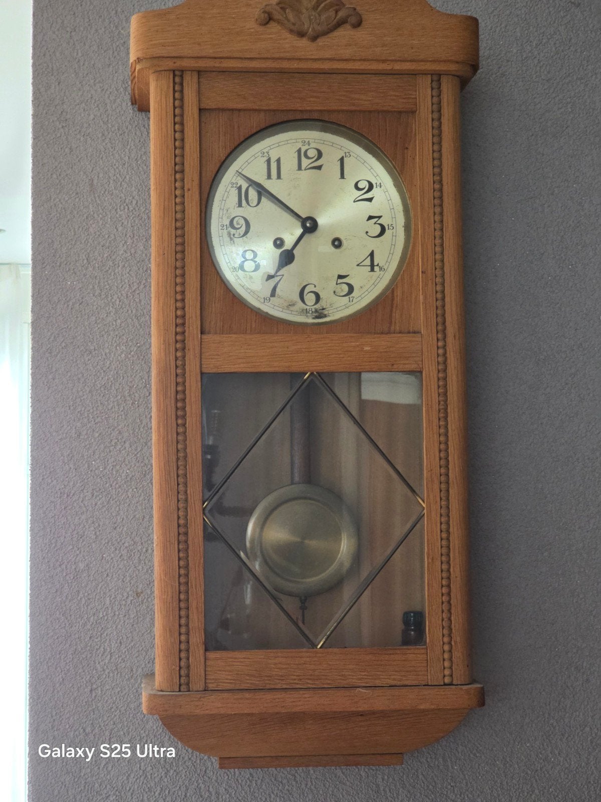Antieke bankregulator wandklok, Ophalen