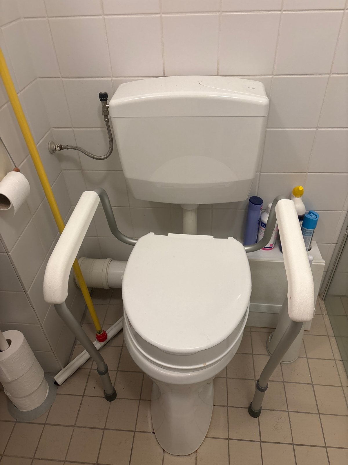 Armleuning toilet, Ophalen