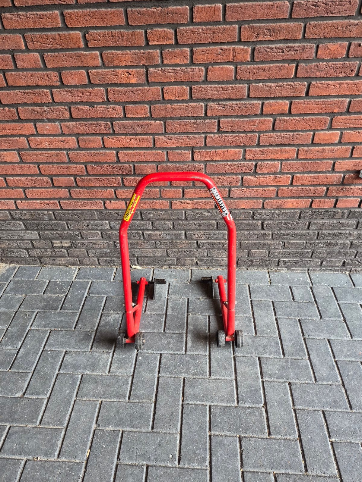 Motorfiets paddockstand achterwiel, Ophalen, Gebruikt