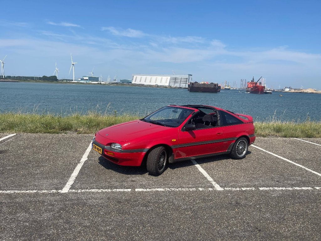 Nissan NX100 1991 73.500 km, Auto's, Nissan, Zwart, 4 stoelen, 1200 kg, Handgeschakeld