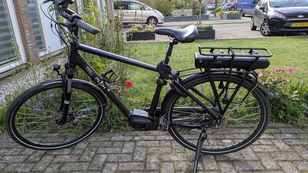 Puch e-bike met sterke, geruisloze Shimano middenmotor, Zo goed als nieuw, 50 km per accu of meer, 55 tot 59 cm, Ophalen