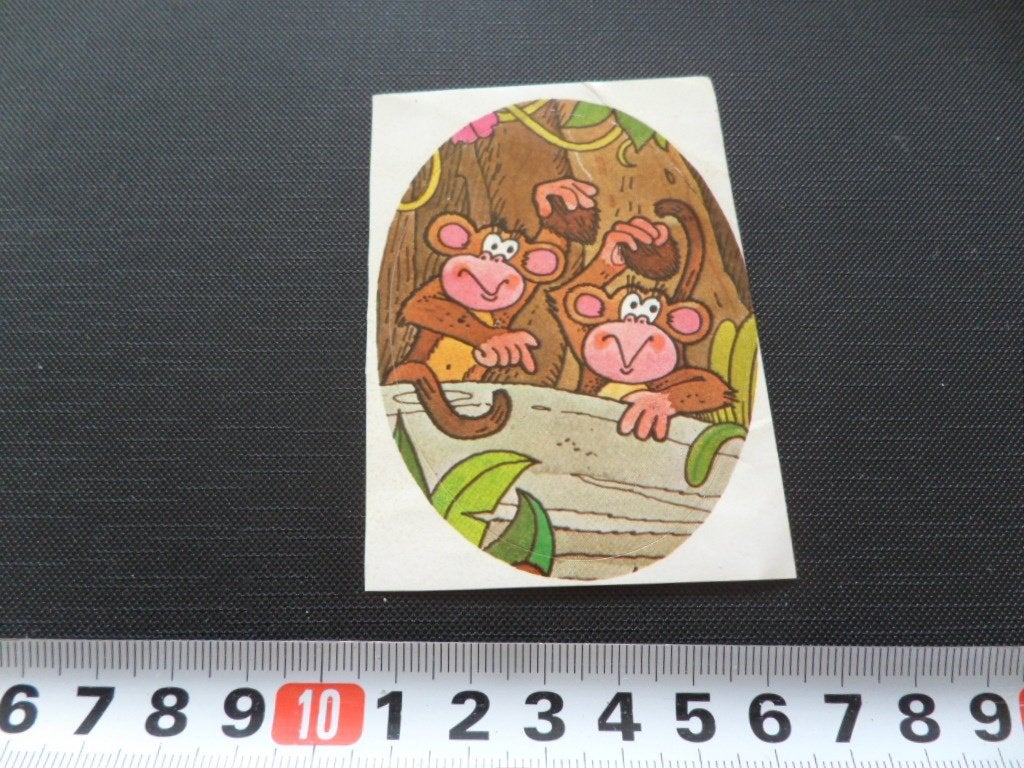 sticker strip aap apen gooien kokosnoot, Ophalen, Zo goed als nieuw