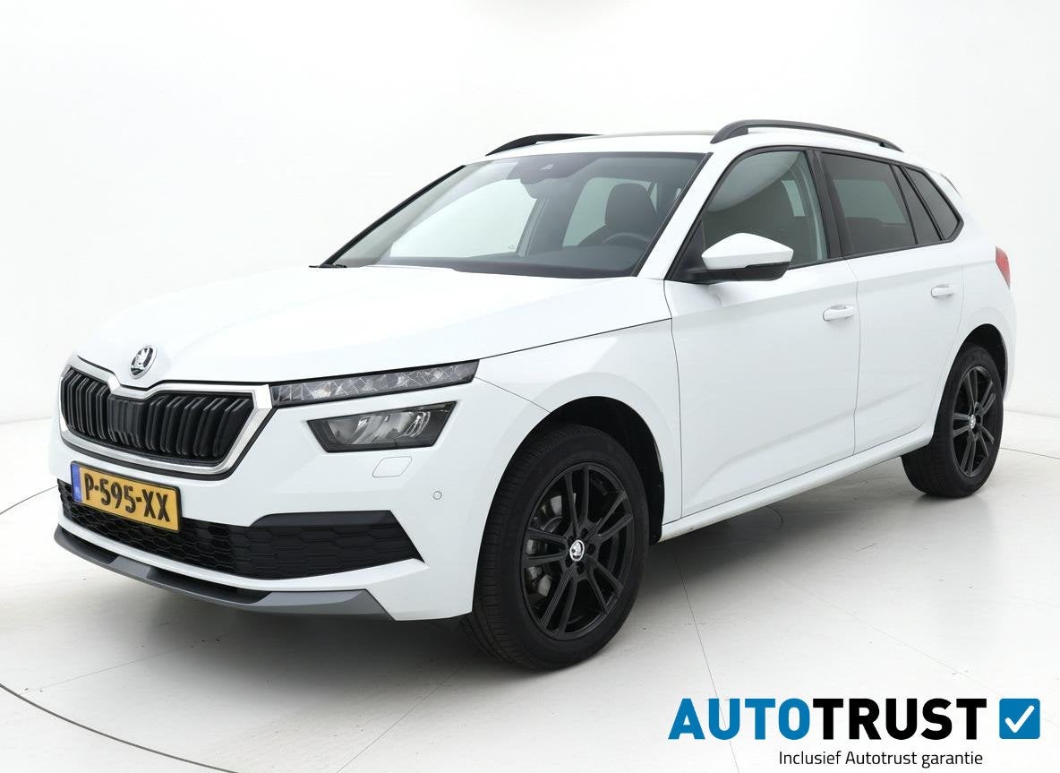 Skoda Kamiq 1.0 TSI Sport Business TREKHAAK CRUISE CLIMA, Gebruikt, Leder en Stof, Wit, Origineel Nederlands