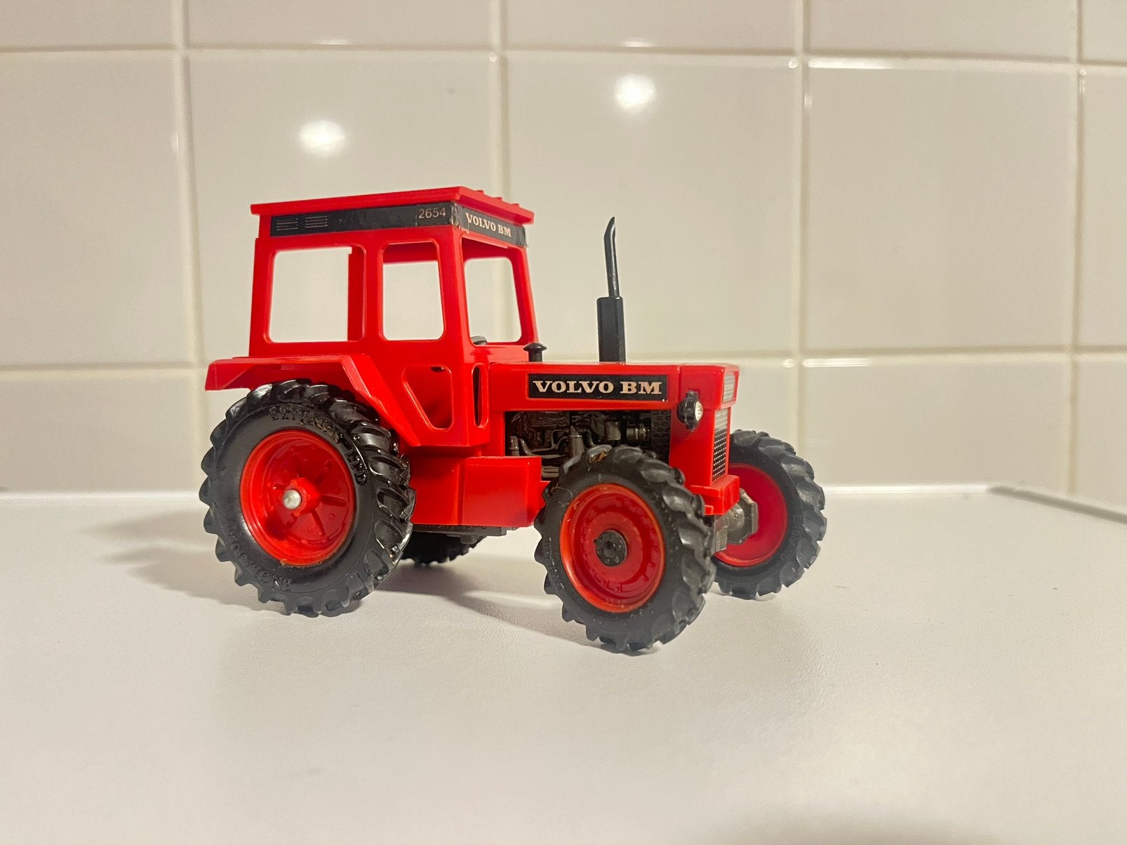 Volvo BM 2654 Britains 1/32, Hobby en Vrije tijd, Ophalen of Verzenden, Gebruikt, Tractor of Landbouw, Britains