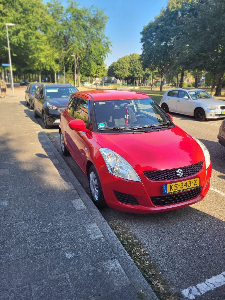 Suzuki Swift 1.2 3-D 2012 Rood, Voorwielaandrijving, Stof, Swift, Handgeschakeld