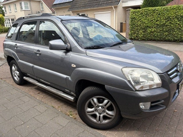 Auto Kia Sportage, Auto's, Kia, Voorwielaandrijving, 4 cilinders, 2000 kg, Leder en Stof