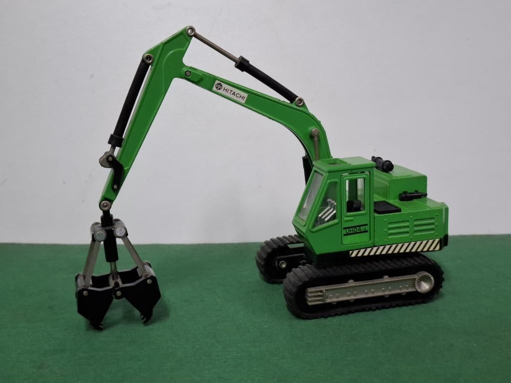 Hitachi UH04  Eidai Toys  1/43, Ophalen of Verzenden, Zo goed als nieuw, Overige typen, Overige merken