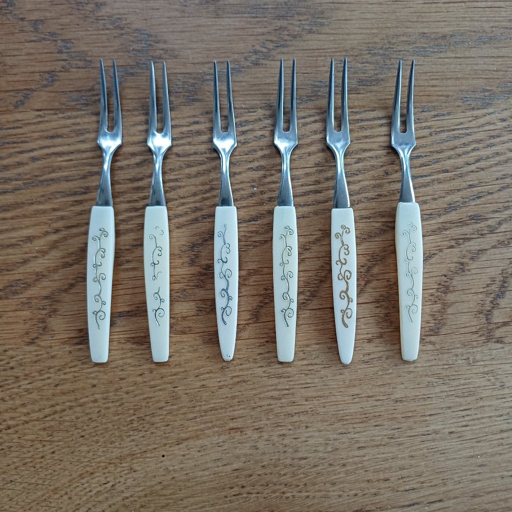 Set van 6 cocktailvorkjes - crème met werkje, Gebruikt, Ophalen of Verzenden, Rvs of Chroom, Overige merken